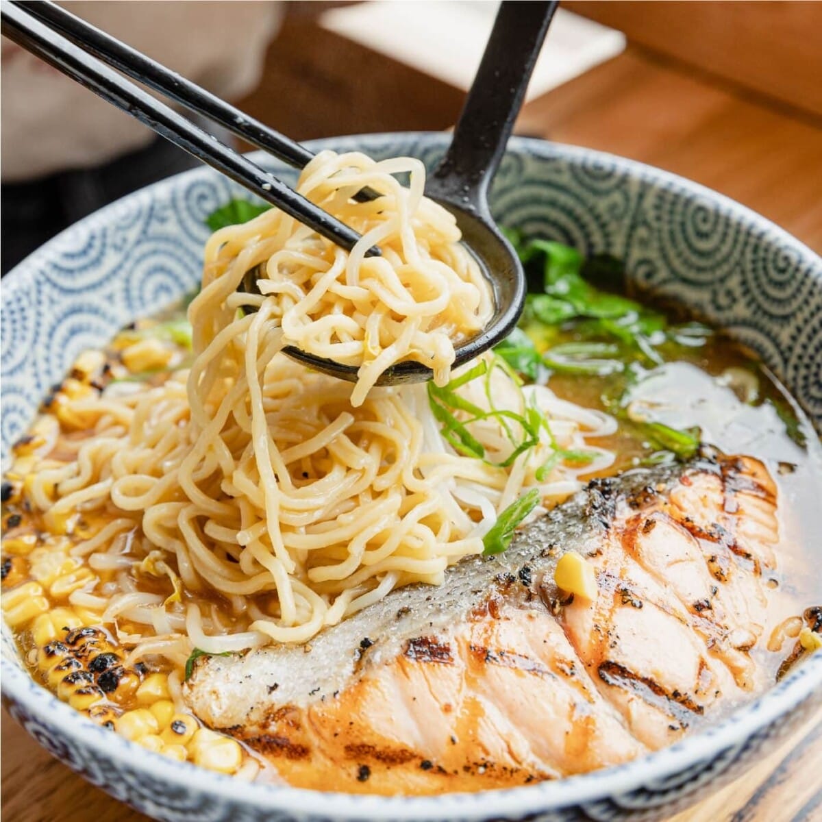 A steaming bowl of ramen at a dog-friendly place in Melbourne. The perfect way to spend a day out in Melbourne with your best friend.