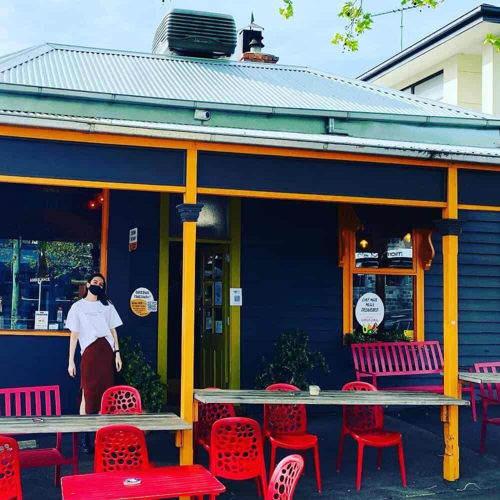View outside a pet friendly cafe with some tables and chairs around the Geelong and Surrounds in Melbourne